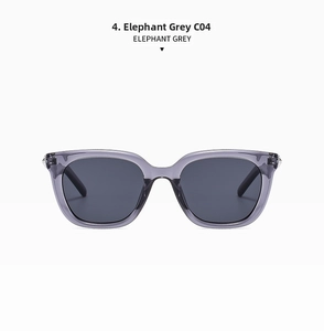 Close-up of elephant grey square frame sunglasses with signature metal studs detail