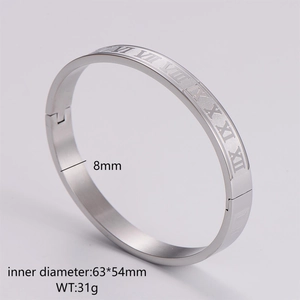 Detailed macro view of 8mm stainless steel bangle with engraved Roman numerals