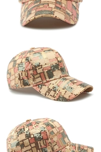 Detail of sequin baseball cap showing pink and grey checkered glitter pattern texture