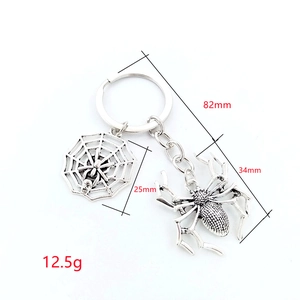 Silver metal Halloween spider and spiderweb keychain with dimensions and weight specs