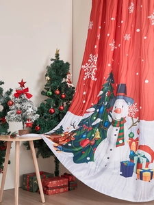 Detail of Christmas snowman curtains with festive gift boxes and holiday decor in red