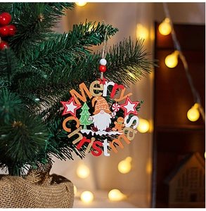 Close-up of wooden Christmas gnome wreath ornament hanging on a festive decorated tree