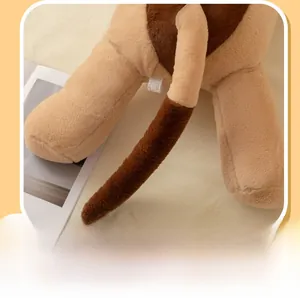 Close-up of plush dog pillow showing tight stitching and soft khaki faux fur texture