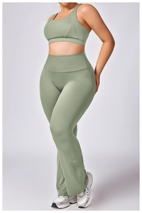 Detail of high-waist flared yoga pants and U-neck sports bra in sage green set