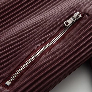 Deep wine red faux leather jacket featuring vintage pleated texture and silver metal zipper