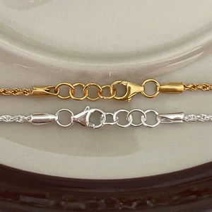 Detail of 925 sterling silver lobster clasp and adjustable chain for rope necklaces