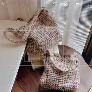 Macro view of multi-color tweed woven tote bag showing detailed texture and soft knit pattern