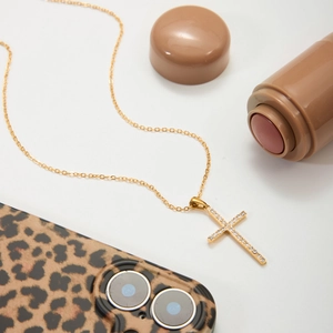 18K gold-plated stainless steel cross pendant necklace with zircon on white background
