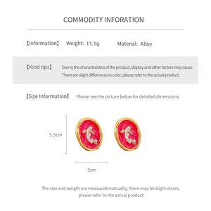 Detailed spec sheet showing vintage koi earrings size 3.5cm by 3cm and 11.1g weight