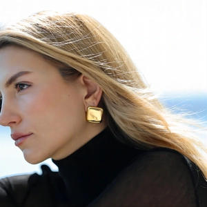 Polished 18k gold-plated irregular square stainless steel earrings on female model