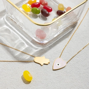Gold stainless steel necklaces with pink enamel evil eye heart and Hamsa Hand charms