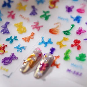 Macro shot of 3D embossed nail stickers with colorful balloon animal designs and textures