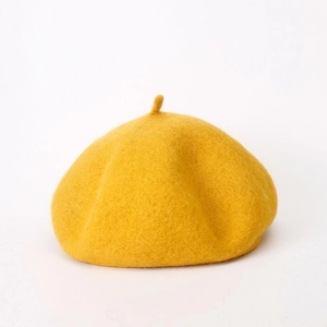 Classic yellow wool beret hat for women with a vintage minimalist design and soft felt texture
