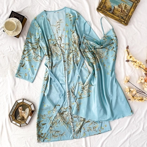 Blue satin sleepwear set with floral print including robe and camisole nightgown