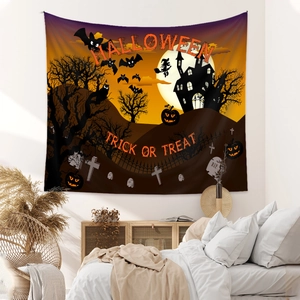 Macro detail of Halloween tapestry featuring pumpkin castle graphics and trick or treat text