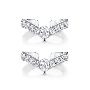 Macro detail of V-shaped silver earrings with pear-cut zircon and micro-pave setting