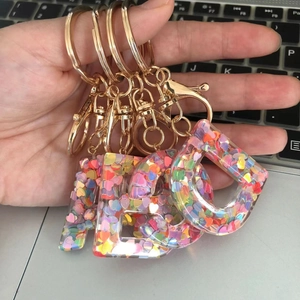 Resin initial keychains A B C D with colorful heart sequins and gold lobster clasp