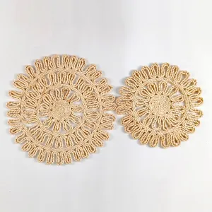 Detail view of round woven corn husk placemats in 30cm, 33cm, and 38cm sizes