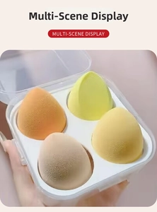 Detail of 4-pack makeup sponge set with teardrop blenders in a clear storage box