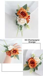 Detailed view of champagne orange artificial rose boutonniere and wrist flower for wedding