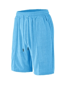 Detailed macro view of bright blue towel jacquard fabric texture on men's casual shorts