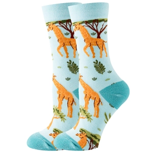 Detail of light blue crew socks with orange giraffe and green leaf patterns on white background