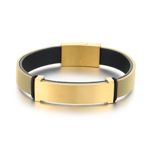 Golden woven mesh bracelet with brushed metal plate and black leather lining on white background