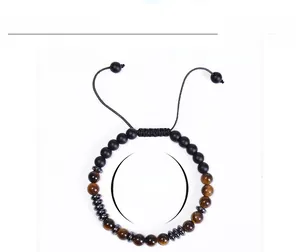 Detail view of adjustable tiger eye and matte stone beads bracelet with 6mm diameter