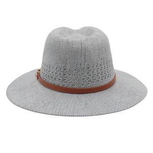 Detail of grey vintage jazz fedora with brown leather buckle band and woven texture