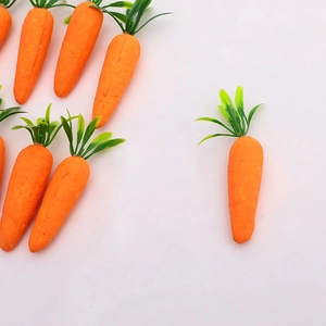 Realistic orange foam carrots with green leaves for Easter and Christmas decorations