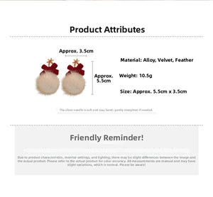 Detailed view of red bow earrings with white pompom and silver needle pins