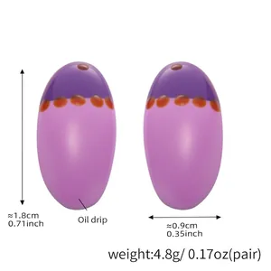 Detail view of 18k gold plated enamel earrings with precise size and weight dimensions
