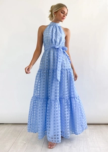 Detail of light blue gingham tiered dress showing halter neck and waist tie ribbon
