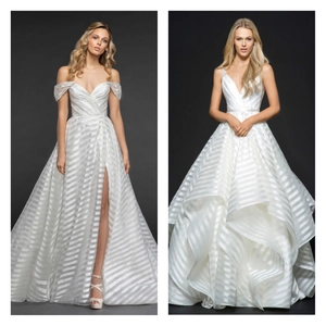 Elegante abito da sposa bianco in pizzo schiena scoperta con strisce e piccolo strascico
