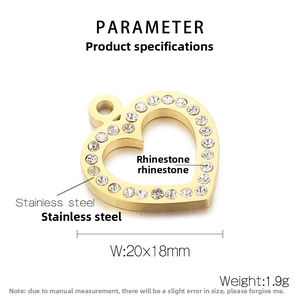 Detailed view of a gold stainless steel hollow heart pendant with white rhinestones