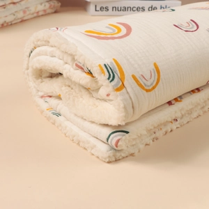 Thick cotton baby swaddle blanket with soft rainbow print and warm sherpa fleece lining