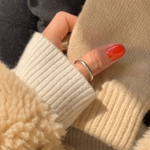 S925 sterling silver minimalist thin line rings shown on model in a soft close-up view