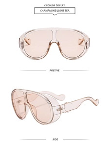 Detail view of champagne oversized sunglasses with flat top lens and heart-shaped temple tips