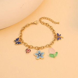 Golden stainless steel necklace featuring colorful enamel butterfly and floral charms