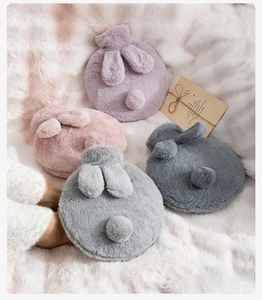 Plush bunny hot water bottle covers in four pastel colors with cute soft ears