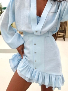 Light blue V-neck lantern sleeve dress with buttons and ruffle hem for a summer look
