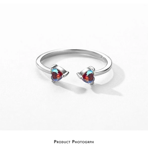 Macro view of S925 silver ring featuring colorful aurora heart-shaped gemstones