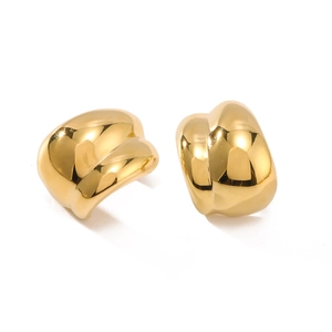 Polished golden twisted C-shaped stainless steel hoop earrings on white background