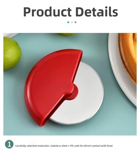 Detail view of a stainless steel pizza cutter wheel with red PP handle on light blue background