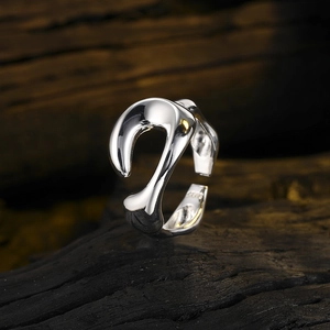 Abstract silver liquid metal ring in minimalist geometric style for men and women