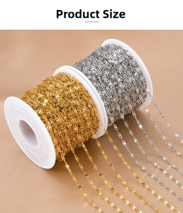 Close-up of gold and silver figure-eight chain links on reels for DIY jewelry making
