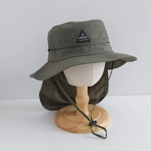 Detail of olive green kids hiking hat with sun protective neck flap and toggle