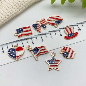 Set of 8 USA flag themed enamel pendants including star and heart shapes with ruler