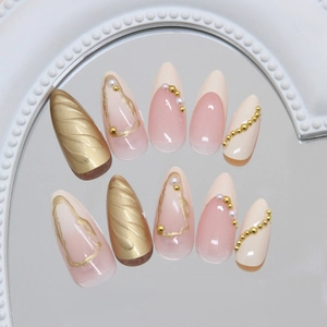French press-on nails with 3D gold relief and pearls on an elegant mirror background