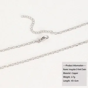 Detailed macro view of silver irregular O-link copper necklace with lobster clasp